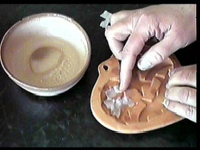 Hand Laying Paper Pieces in Mold